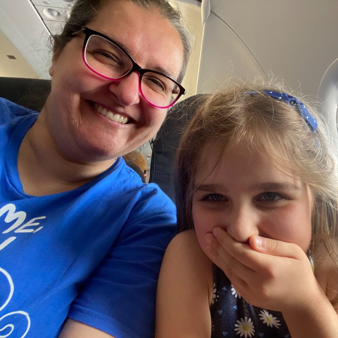 Happiness me (Chiara Briganti) and my daughter laughing on the plane